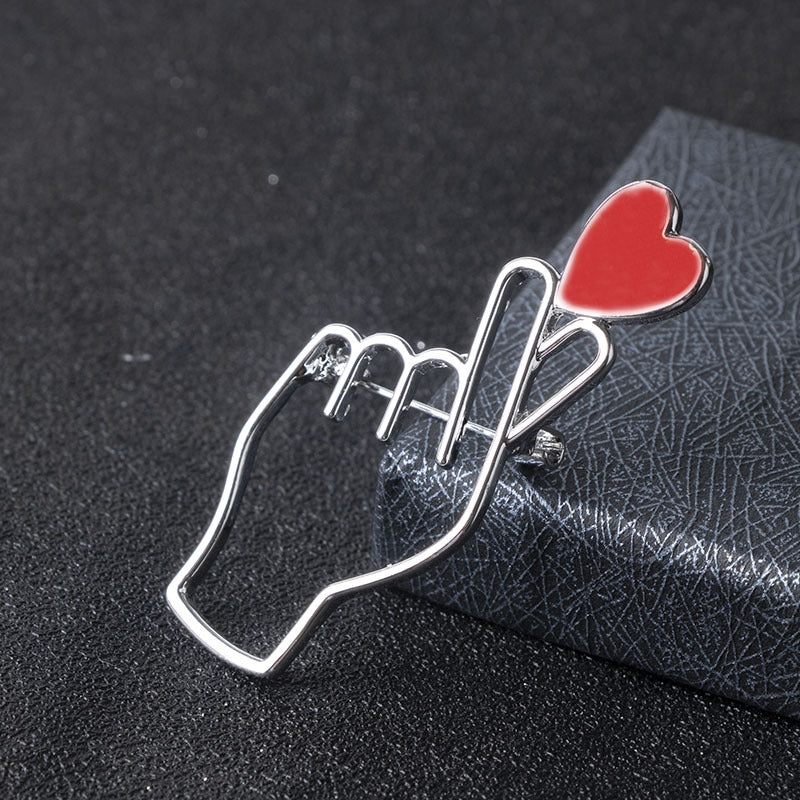 Broche Argentée Doigts Coeur Coréen